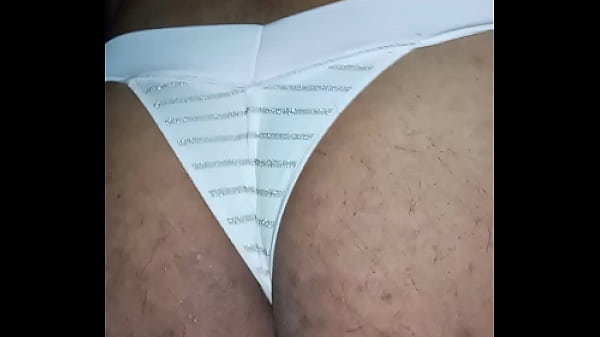 Sissy guy wearing pink thong