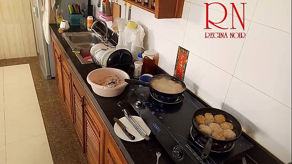 Nudist housewife Regina Noir cooks at the kitchen. Naked maid. Naked housewife. c1