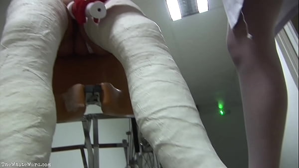 Patient in Wheelchair with Broken Legs and Straitjacket - TheWhiteWard.com