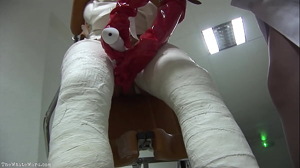 Patient in Wheelchair with Broken Legs and Straitjacket - TheWhiteWard.com
