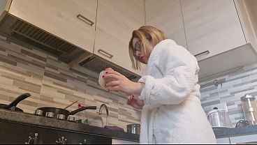 Blonde slut naked in the kitchen