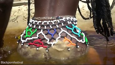 Skinny dark skinned tribe lady with muddy perfect tits