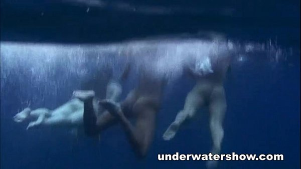Three girls swimming nude in the sea
