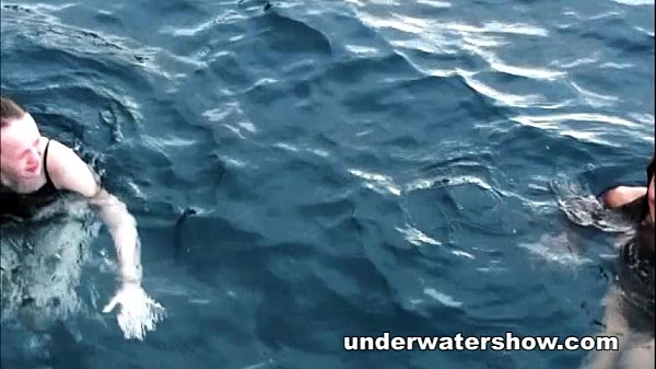 Three girls swimming nude in the sea