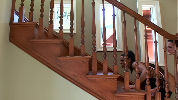 Tory Lane sticks a giant pink dildo up Veronica Rayne's ass while she's leading her up a...