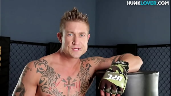 Ripped tattoo stud wanks his shaved rod until spraying jizz