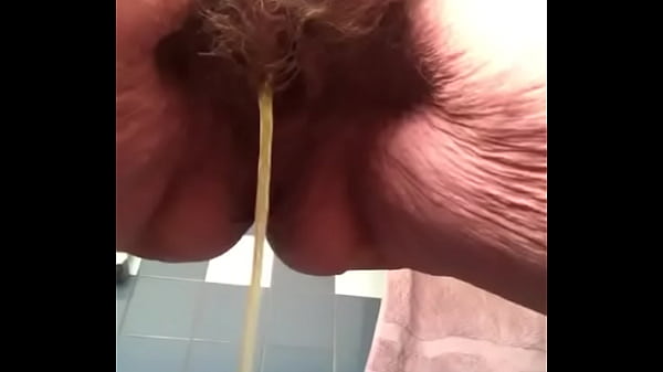 Granny peeing hairy pussy