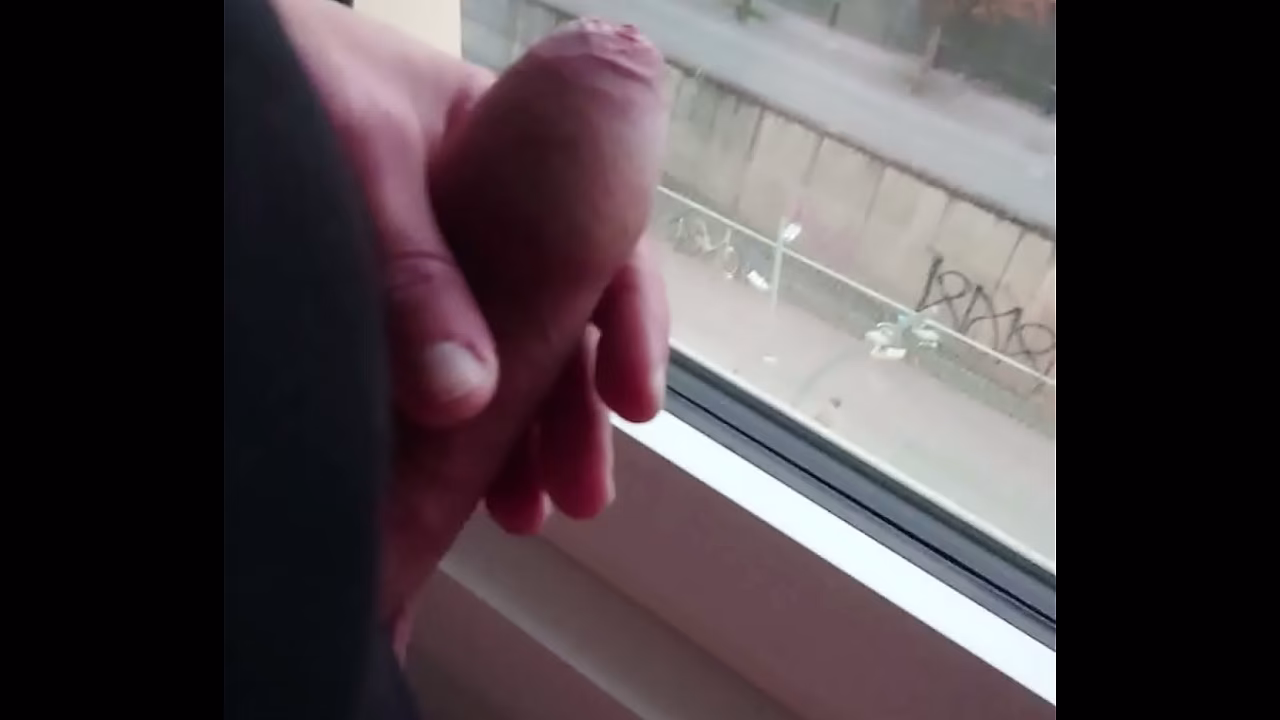 Jerk off at the hotel window