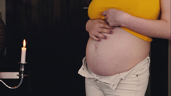 Preggo Angel Princess oils her massive melons