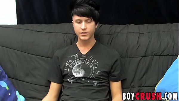 Young gay man jerks off his giant dick during a...