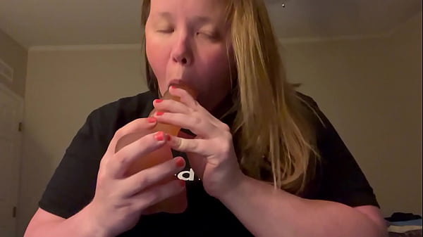 Kitty gags on large dildo