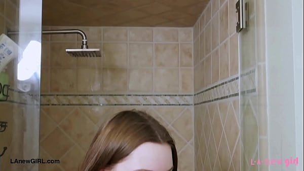 Cute teen model enjoys a sensual bath