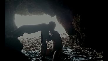 Couple recorded at the beach, inside the cave