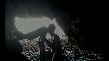 Couple recorded at the beach, inside the cave