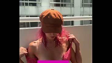 flashing my small tits on the balcony... i hope the neighbors are watching