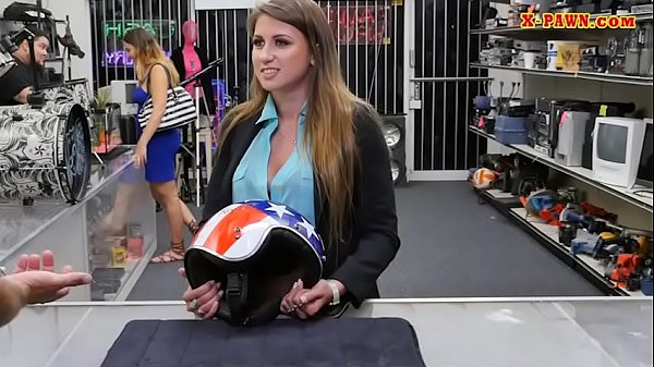 Busty woman sells helmet and railed good