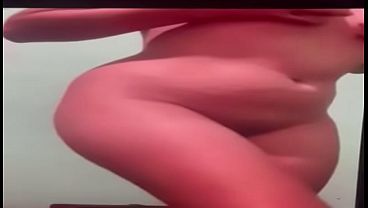 Latina enjoying herself in front of the camera