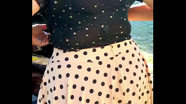 Sexy Girl dress in the Outdoor - flashes her bra cleavage