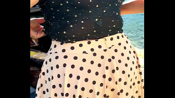 Sexy Girl dress in the Outdoor - flashes her bra cleavage