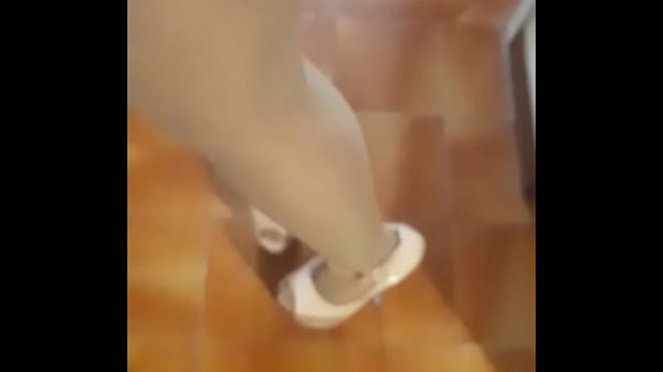 Milf with extreme high heels and pantyhose walking