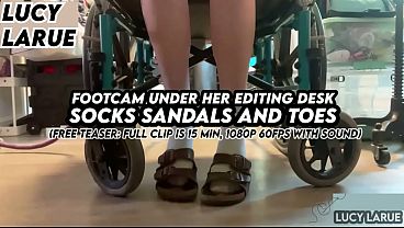 "FootCam Under Her Editing Desk Socks Sandals and Toes"