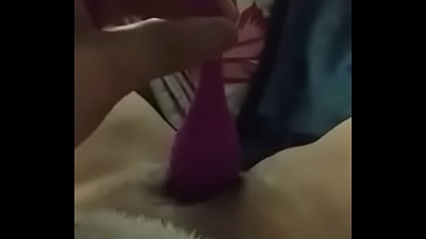 Girlfriend doing herself with a toy