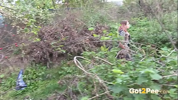 Pretty Girl Pees in Nature