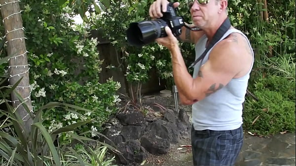 Blonde MILF Kristal Summers sees her gardener outdoors working in the backyard so, she...