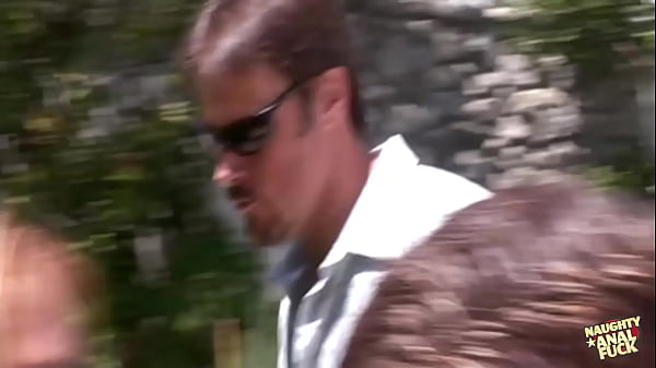 Two horny dudes take advantage of horny busty whores to make an outdoor group sex