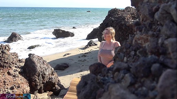 Peeping voyeur fucks blonde MILF on the beach