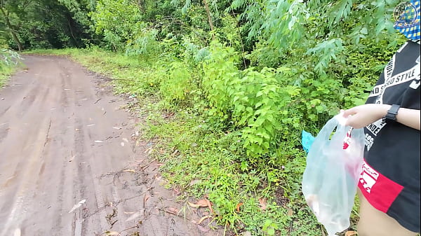 Thai girl walks and shows her pussy on the side of the road. Clear Thai voice.