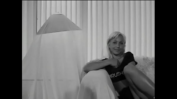 Wet pussy is fucked by a large dildo