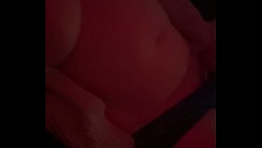 Playing with my vibrator making myself cum under a red strobe light