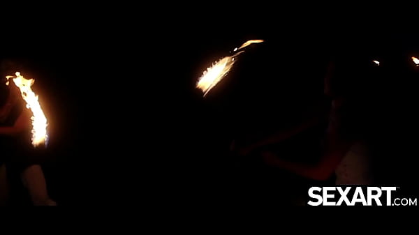 Gorgeous girls lick each other's pussy under the stars in Tahiti