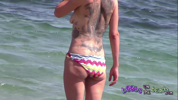 Large Tattoo on back of Skinny German MILF getting angry with her phone sex