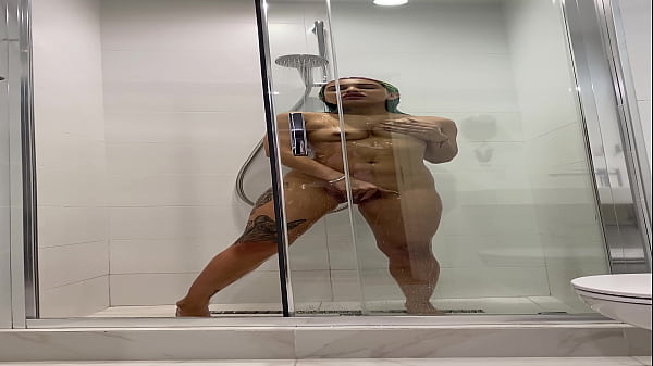Naked Roxy showers and Masturbates