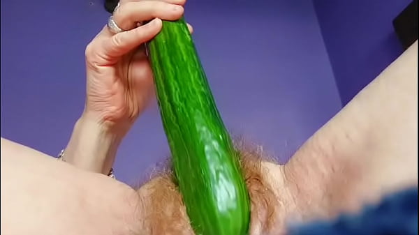 Granny fucks hairy pussy with cucumber