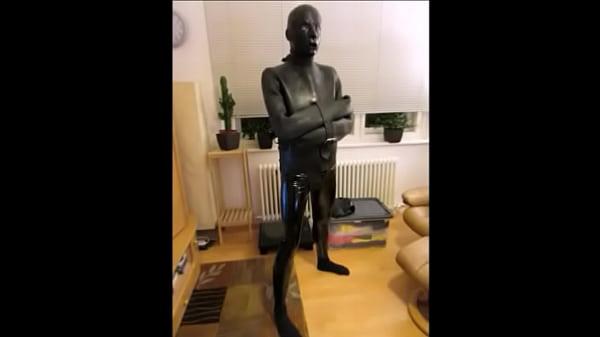 077 Escape proof packed in heavy rubber straitj...