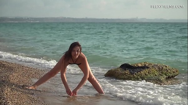 Kim Nadara sexy gymnastics by the sea