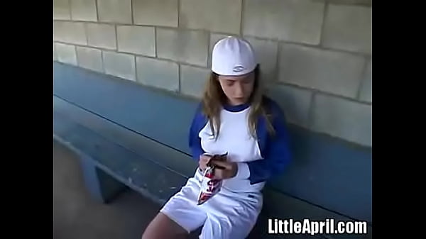 Little April Plays With Herself After A Game Of Baseball