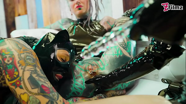 One Latex Domme & Two Latex Sub Girls