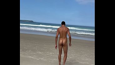 Naked guy on the beach