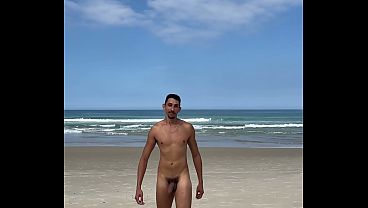 Naked guy on the beach