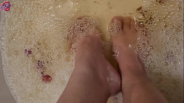Washing my feet with rose petals and herbs after a HARD day of work