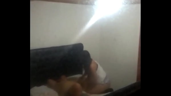 I record my stepsister fucking my stepfather, my stepmother's husband fucks her stepdaughter. Video recorded with my cell phone through the window of the bedroom door