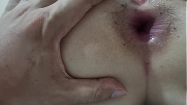 thumb opening her ass