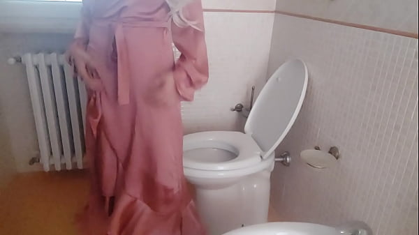 the warm pee of my stepmother dressed in elegant silk during a party