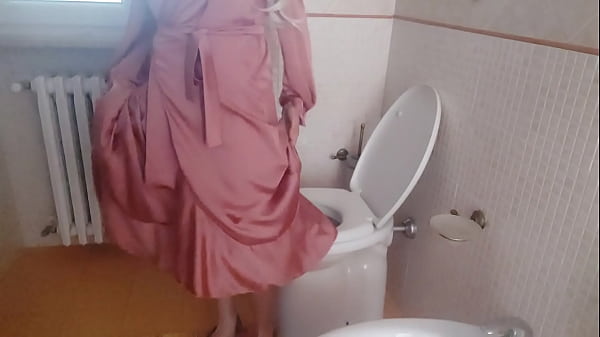 the warm pee of my stepmother dressed in elegant silk during a party