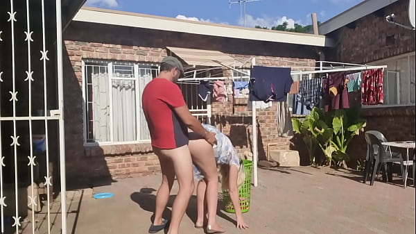 Outdoor fucking while taking off the laundry