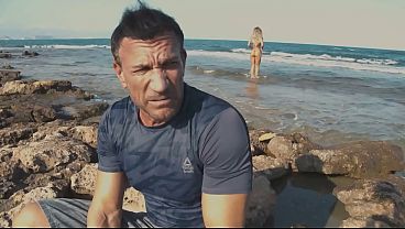 Brianna and Marco Banderas fuck on the beach in full view of many onlookers, letting several of them join in